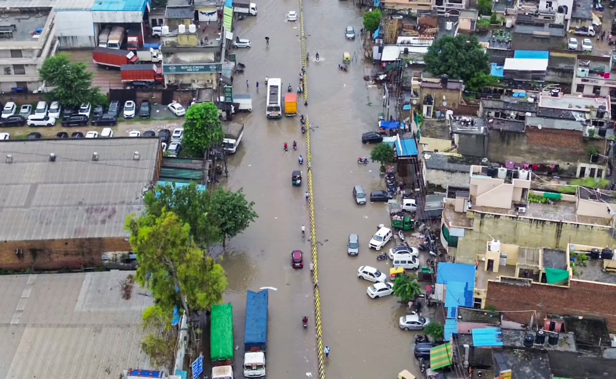 A drone visual shows a waterlogged road in Gurugram following incessant heavy rainfall in Haryana. A drone visual shows a waterlogged road in Gurugram following incessant heavy rainfall in Haryana.