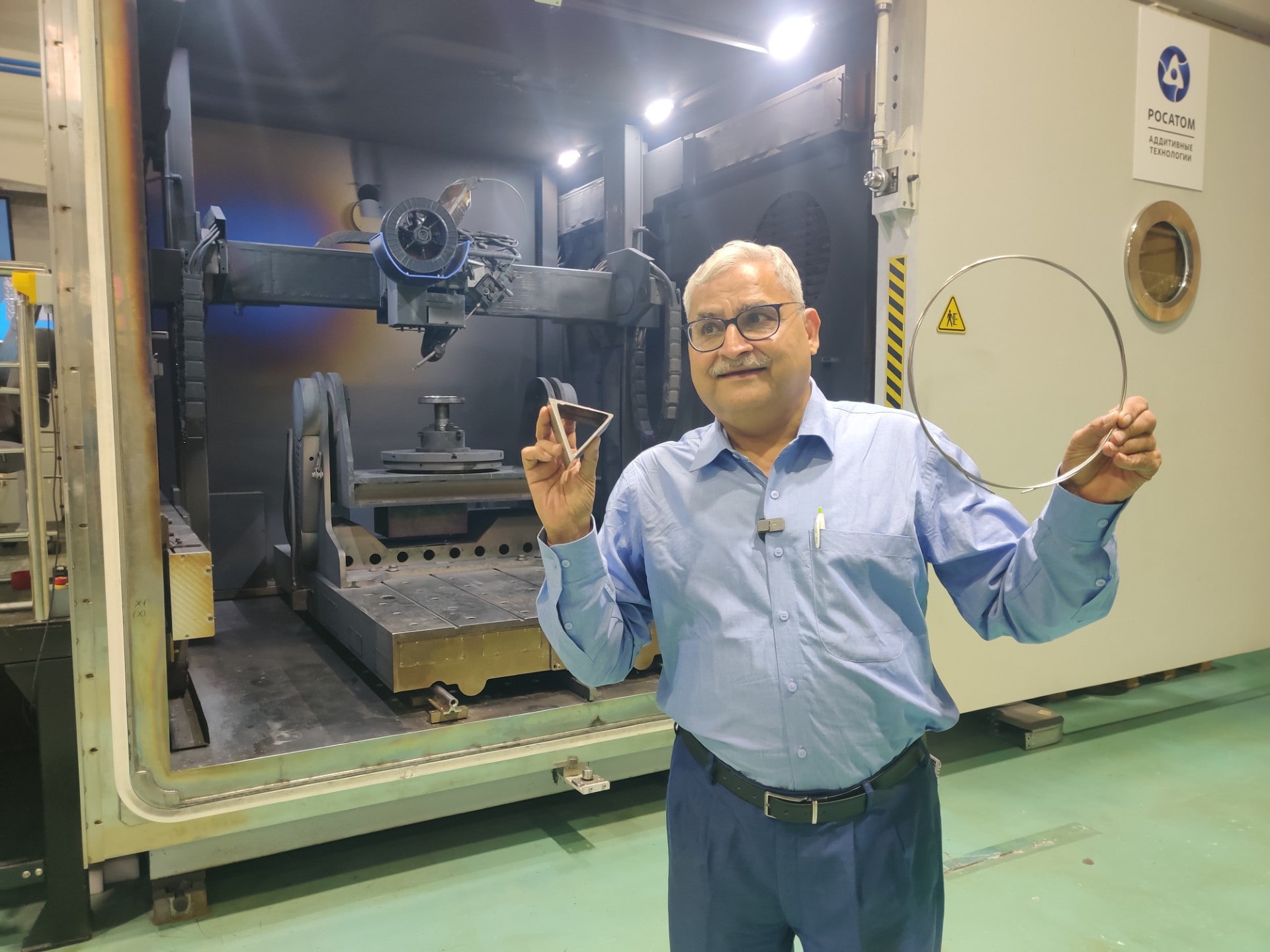 NDTV's Science Editor Pallava Bagla with Titanium wires and 3D printed parts in front of the Rosatom high tech printer that will be shipped to India NDTV's Science Editor Pallava Bagla with Titanium wires and 3D printed parts in front of the Rosatom high tech printer that will be shipped to India