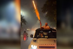 Man Pokes Head Out Of Sunroof, Bursts Aerial Fireworks In Moving Car Man Pokes Head Out Of Sunroof, Bursts Aerial Fireworks In Moving Car
