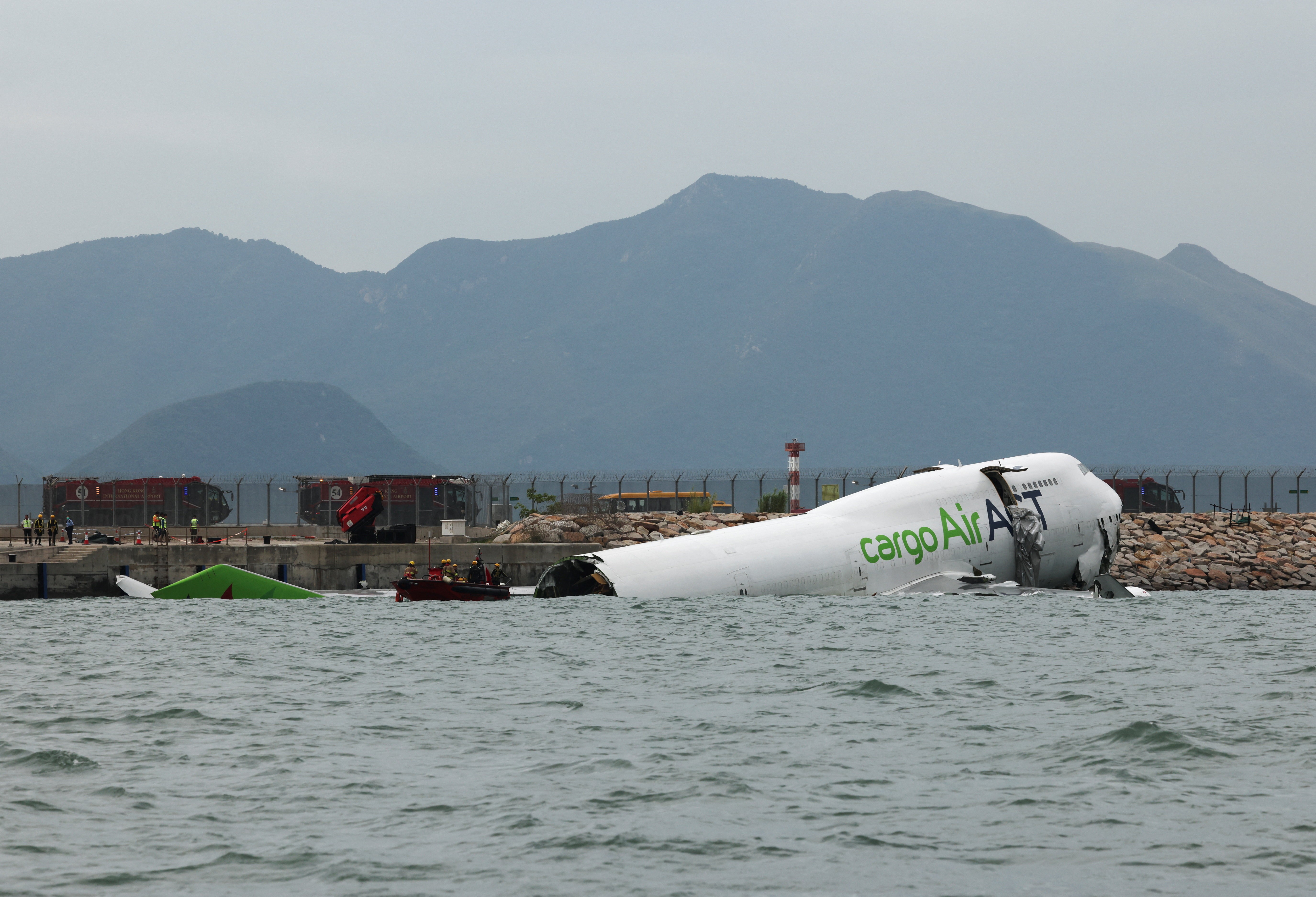 2 Dead As Cargo Plane Skids Off Hong Kong Airport Runway Into Sea