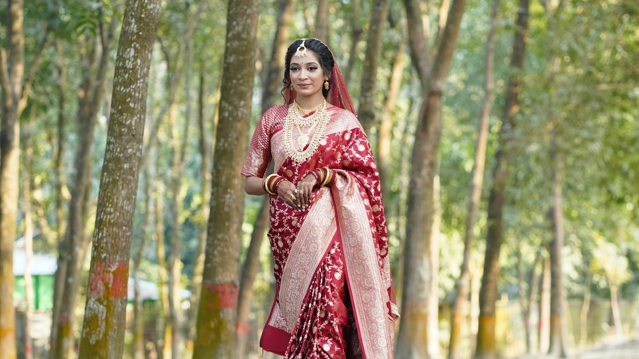 Let your natural beauty shine through with these red sarees from Myntra