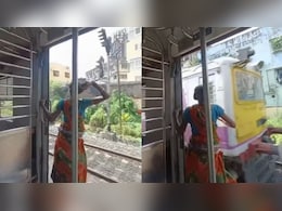 चलती ट्रेन के दरवाजे पर खड़ी थी महिला, अचानक सामने से आ रही ट्रेन पर दे मारा पत्थर, देख हक्के बक्के रह गए लोग चलती ट्रेन के दरवाजे पर खड़ी थी महिला, अचानक सामने से आ रही ट्रेन पर दे मारा पत्थर, देख हक्के बक्के रह गए लोग