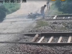 On Camera, UP Man Falls From Bike While Crossing Railway Track, Run Over By Train
