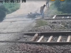 On Camera, UP Man Falls From Bike While Crossing Railway Tracks, Run Over By Train