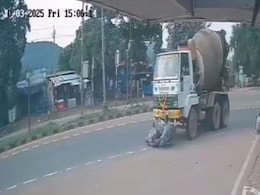Video: Biker Loses Control And Disappears Under Cement Truck. He Survives Video: Biker Loses Control And Disappears Under Cement Truck. He Survives