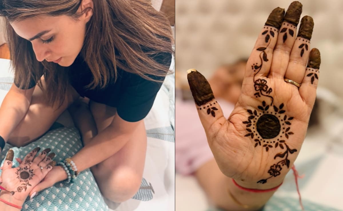 Kriti Sanons turns into henna artist for mom. Photo: Instagram/kritisanon Kriti Sanons turns into henna artist for mom. Photo: Instagram/kritisanon