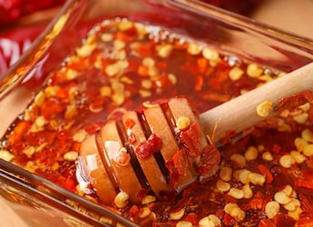 Why Everyone Is Drizzling Hot Honey On Pizza, Chicken, And Even Ice Cream Why Everyone Is Drizzling Hot Honey On Pizza, Chicken, And Even Ice Cream