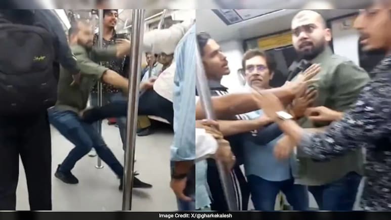 Delhi Metro Turns Into Wrestling Arena As Two Men Trade Punches, Kicks In Viral Video Delhi Metro Turns Into Wrestling Arena As Two Men Trade Punches, Kicks In Viral Video