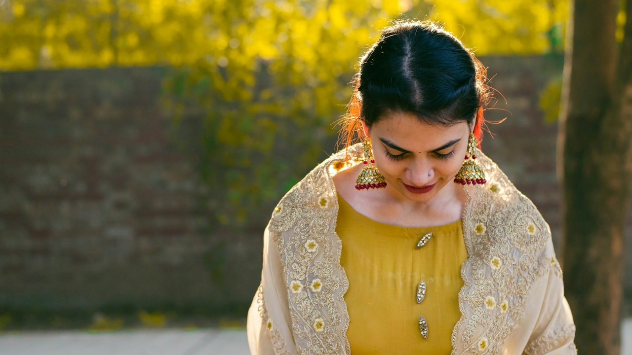 Experiment by pairing jhumkas with different hair styles 