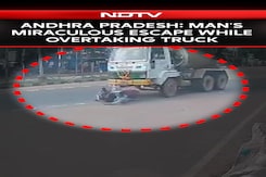 Biker Loses Control And Disappears Under Cement Truck. He Survives Biker Loses Control And Disappears Under Cement Truck. He Survives