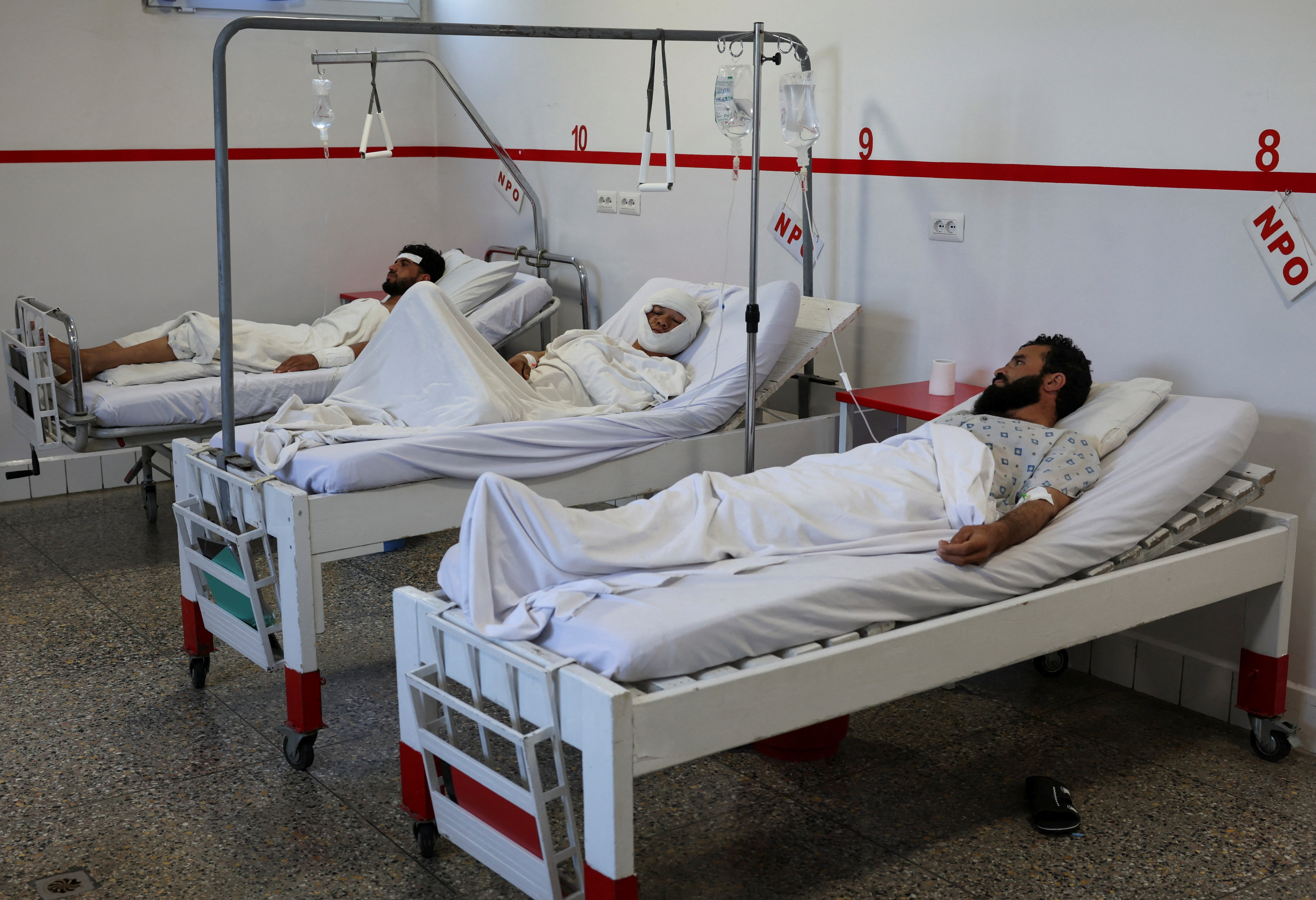 People injured during airstrikes amid the conflict between Afghanistan and Pakistan, lie on hospital beds following a temporary ceasefire, in Kabul, Afghanistan October 16, 2025. People injured during airstrikes amid the conflict between Afghanistan and Pakistan, lie on hospital beds following a temporary ceasefire, in Kabul, Afghanistan October 16, 2025.