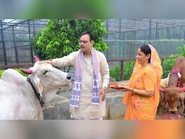गोपाष्‍टमी पर सीएम ने पत्‍नी के साथ गायों की पूजा की, आरती उतारी और चना खिलाया