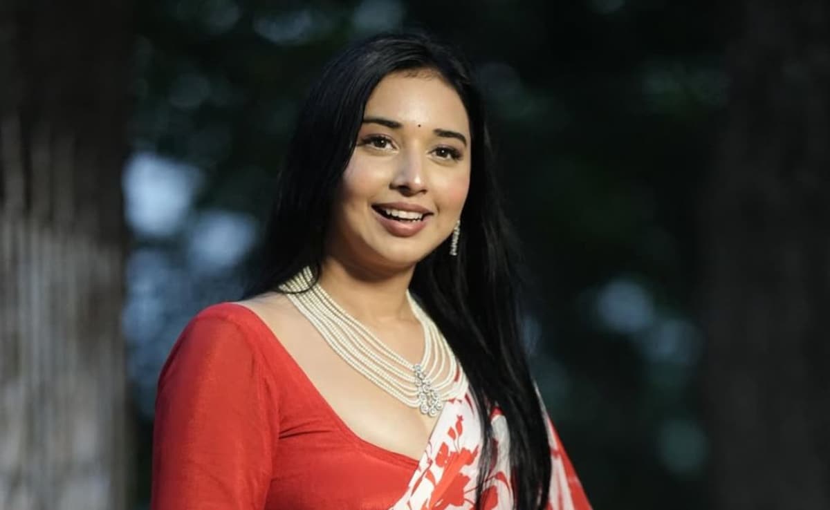 Tanya Mittal posing in a red saree Tanya Mittal posing in a red saree