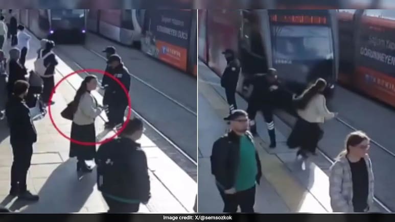 Video Shows Moment Security Guard Saves Woman From Being Hit By Tram In Turkey Video Shows Moment Security Guard Saves Woman From Being Hit By Tram In Turkey