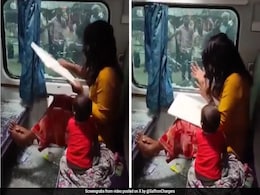 Distressed Woman Smashes Train Window, Toddler Sits Amid Glass Shards Distressed Woman Smashes Train Window, Toddler Sits Amid Glass Shards