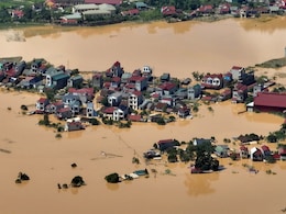 8 Dead, Thousands Stranded As Vietnam Floods Bring Rivers To 40-Year High 8 Dead, Thousands Stranded As Vietnam Floods Bring Rivers To 40-Year High