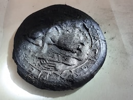 Archaeologists Find 1,200-Year-Old Bread With Jesus Christ's Face Archaeologists Find 1,200-Year-Old Bread With Jesus Christ's Face