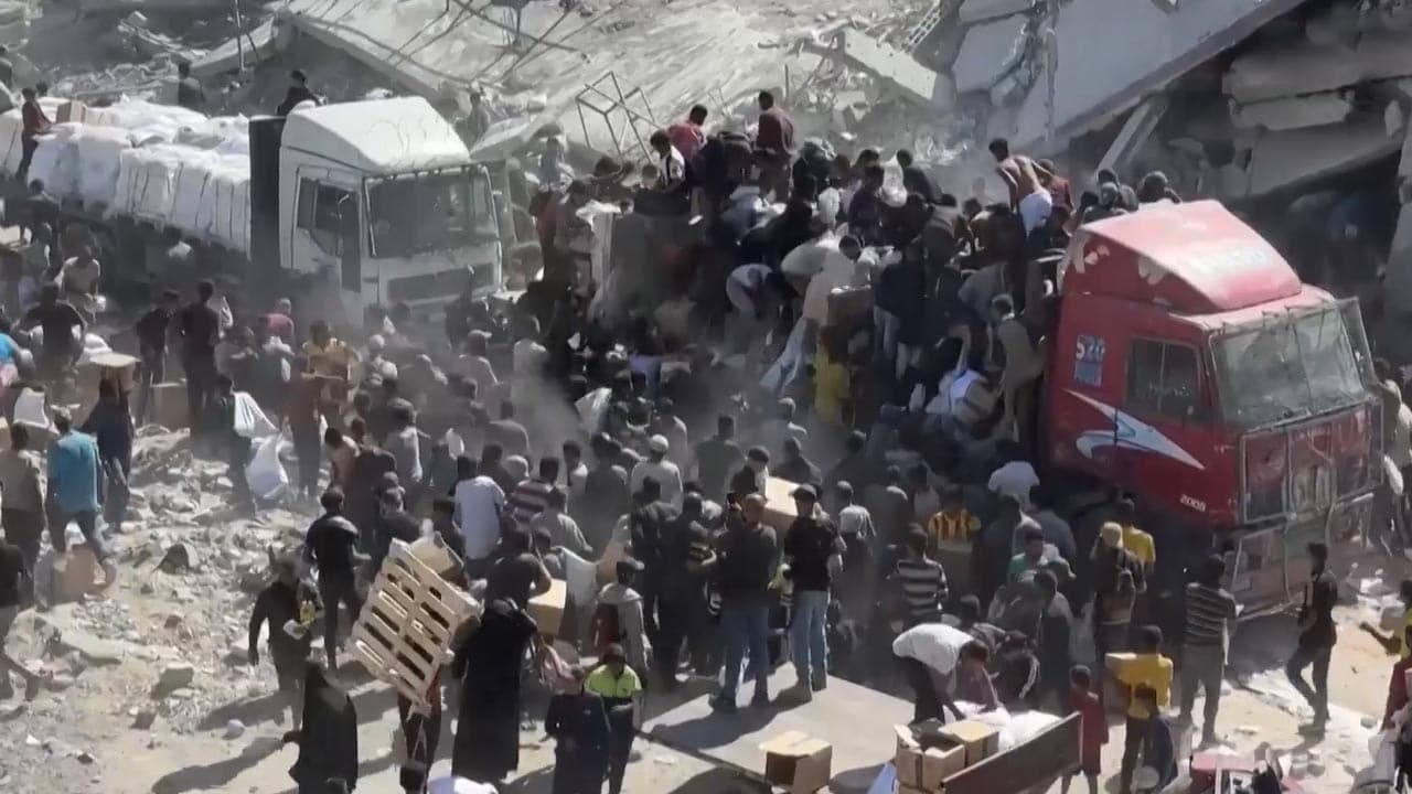 Locals Swarm Aid Trucks In Gaza After Ceasefire Deal, Grab Supplies
