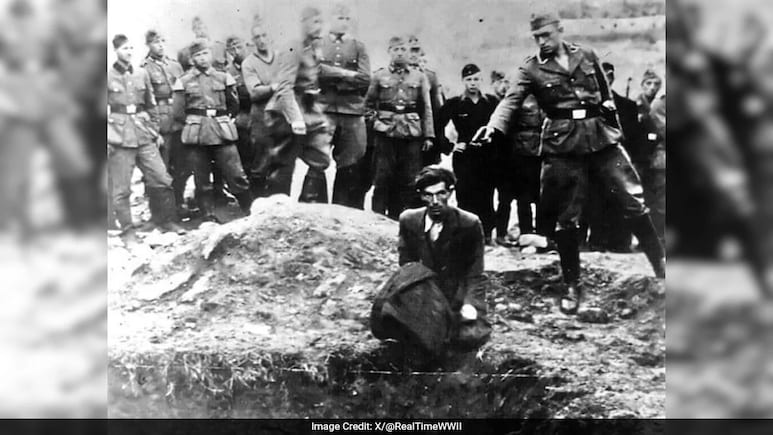 AI Helps Identify Nazi Killer From Haunting Holocaust Image AI Helps Identify Nazi Killer From Haunting Holocaust Image