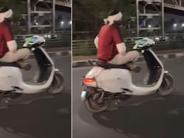 बिना हैंडल पकड़े आलती-पालती मारकर सड़क पर स्कूटी दौड़ा रहा था शख्स, लड़की बोली- गजब ही कैरेक्टर हैं लखनऊ में!