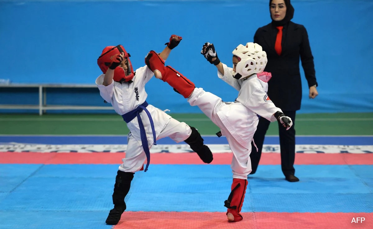 "Anything But Violent": Iran Girls Kick Down Social Barriers With Karate