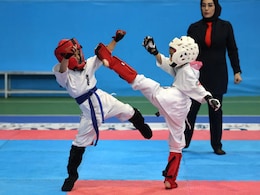 "Anything But Violent": Iran Girls Kick Down Social Barriers With Karate