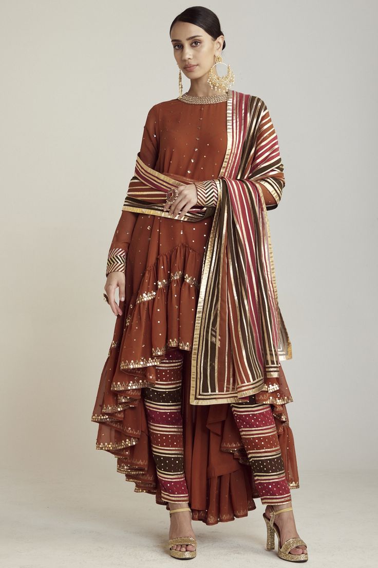 Say goodbye to asymmetrical hems; symmetry is the new chic