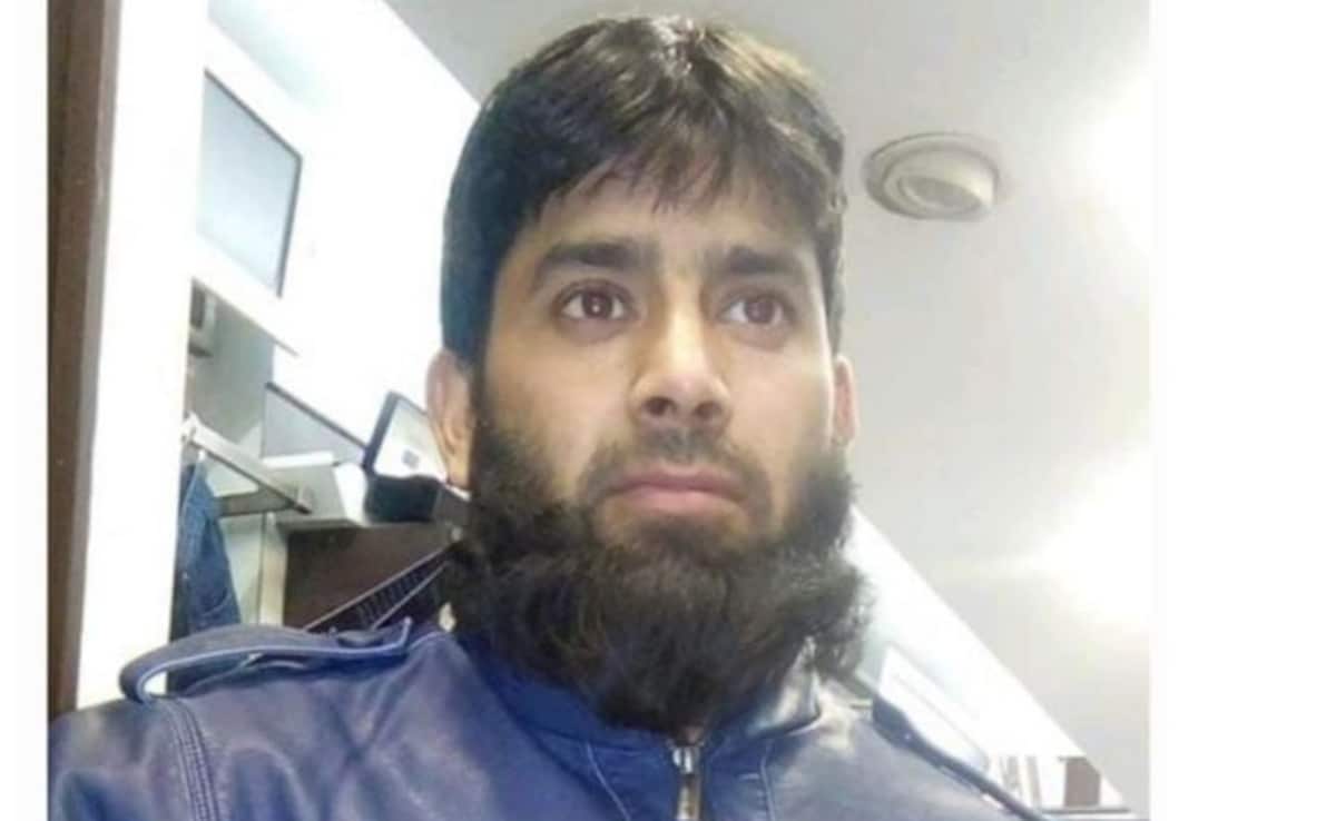 Tariq Malik, 44, was employed as security guard at a bank in Pulwama. Tariq Malik, 44, was employed as security guard at a bank in Pulwama.