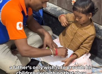 'Swiggy Dad' Goes Viral For Tutoring Daughter Between Food Deliveries