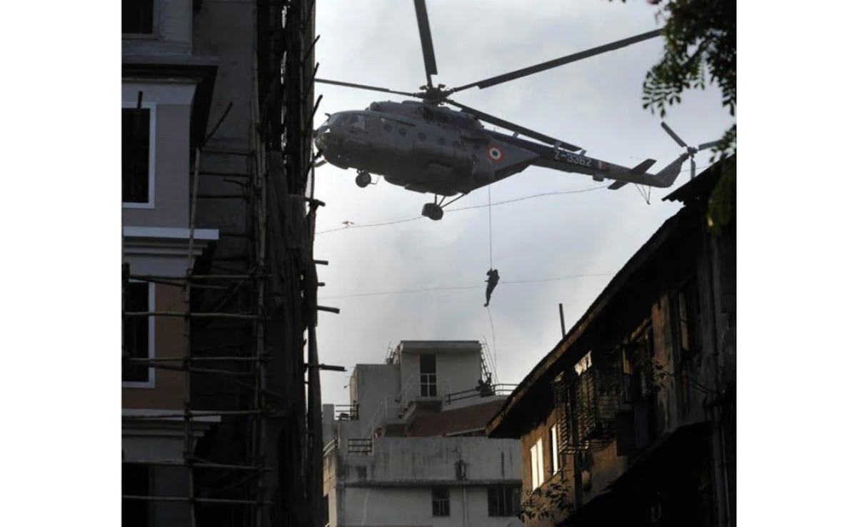This image shows how NSG commandos came down a rope, from a helicopter to reach the top of the Nariman house.