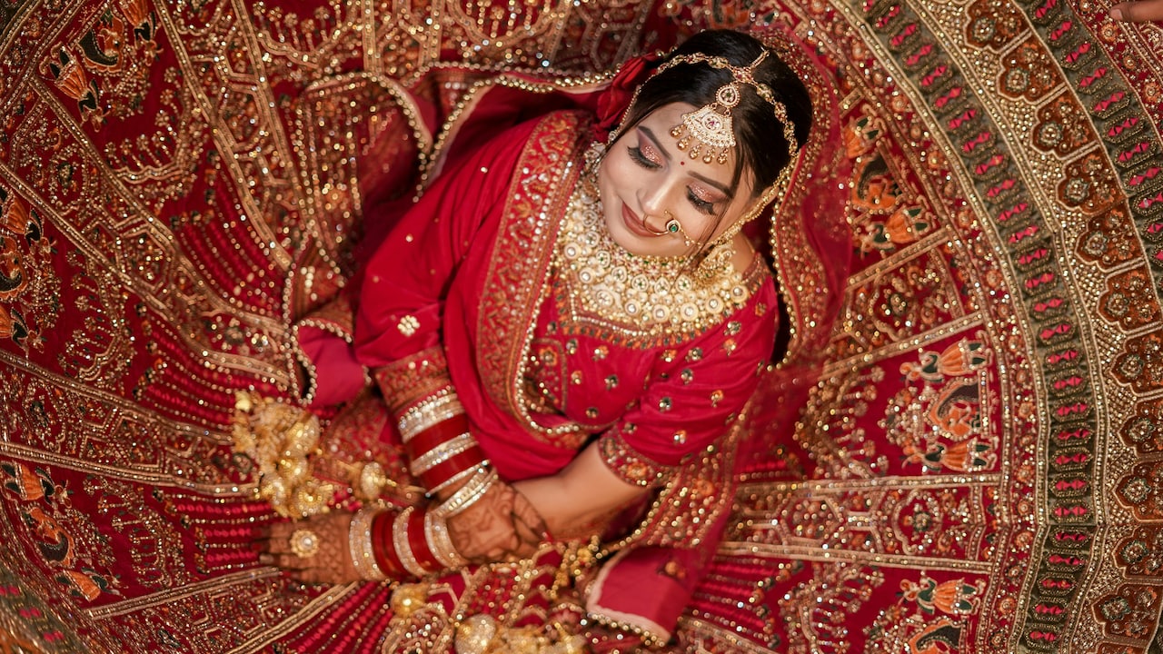 From pinks to maroons, discover stunning bridal lehengas for wedding reception under 10000