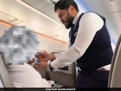 Saudi Airlines Attendant Feeding An Elderly Passenger Melts Hearts Online