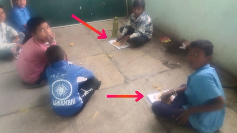 Buldhana News: आदिवासी विद्यार्थ्यांना रद्दीच्या पेपरवर जेवण;बुलढाण्याच्या ZP शाळेतील संतापजनक प्रकार