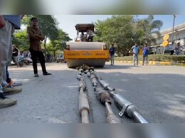 इंदौर ट्रैफिक पुलिस की बड़ी कार्रवाई, 1500 मॉडिफाइड साइलेंसर और 60 हूटर पर चला रोडरोलर