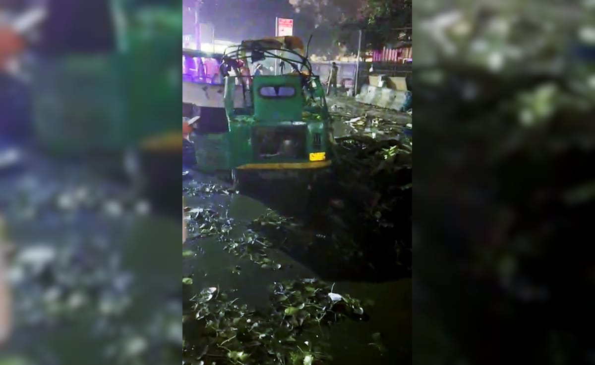 Charred remains of vehicles and glass scattered on the road at the blast spot. ANI