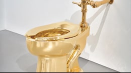 Gold Toilet Called "America" Sold For $12.1 Million At An Auction