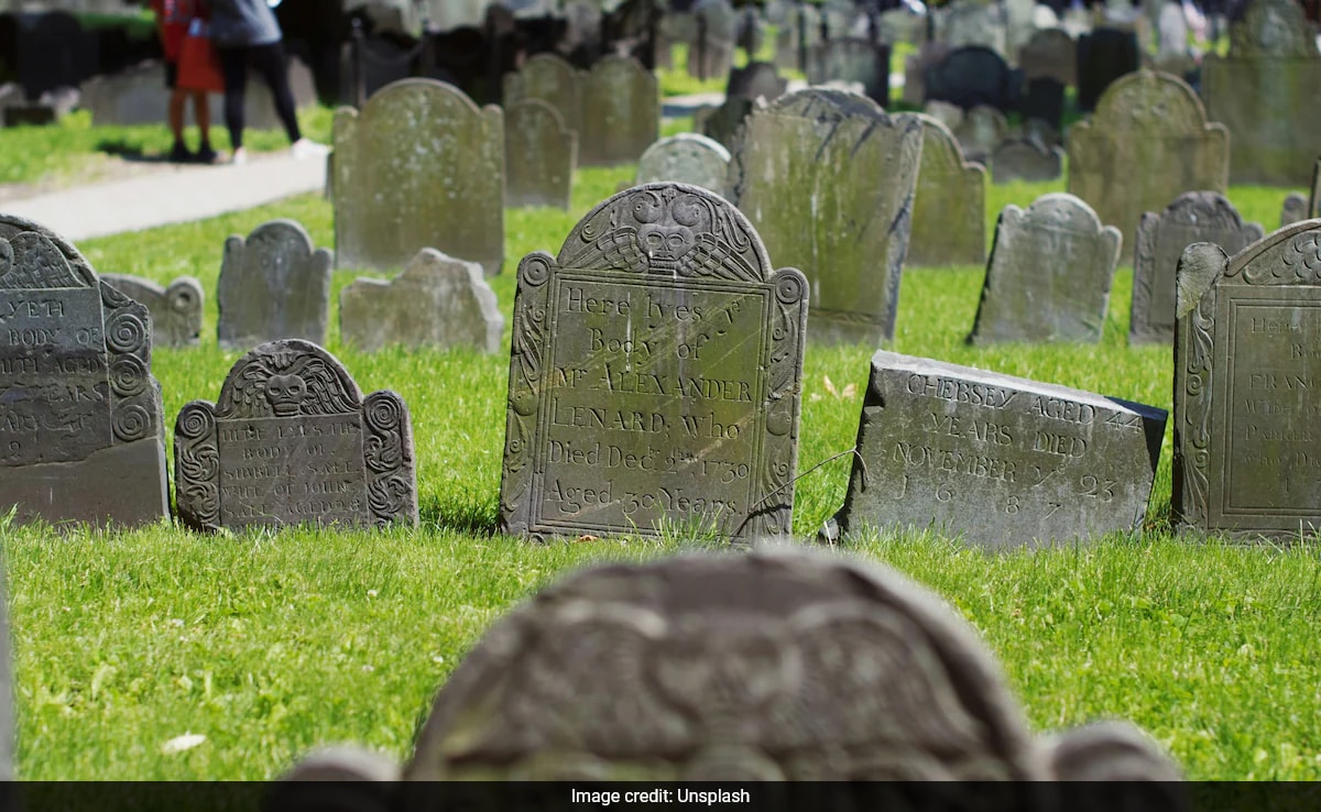 Chinese Mother Kissing Son's Gravestone In Emotional Tribute Moves Millions: "Mama Is Here"