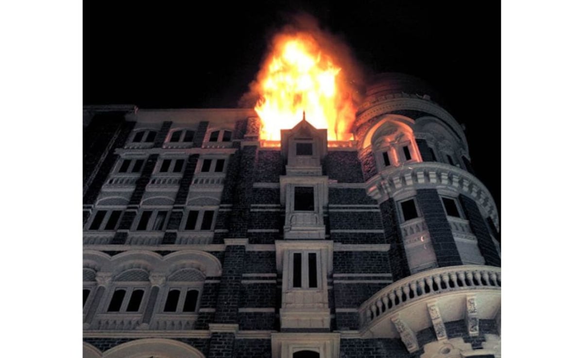 Fire engulfs the top floor of the Taj Mahal hotel on November 26, 2008.