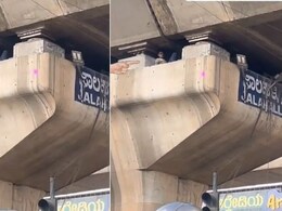 फ्लाईओवर के खंभे के अंदर सोता मिला शख्स, वायरल Video देख लोग हैरान, बोले- यह कैसे संभव है?