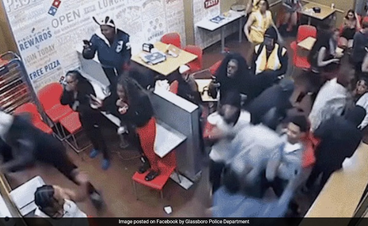 On Camera, Cop Hit In Head With Chair During Brawl At New Jersey's Domino's