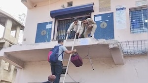 Stairway To...Cash? Customers Scale Ladder After SBI Stairs Demolished