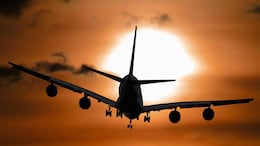 Flying Overnight? 10 Simple Tricks To Beat Jet Lag And Land Looking Alive