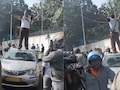 नौकरी छूटने पर घूम गया दिमाग, चलती कैब में की ये हरकत...फिर कार की छत पर चढ़कर करने लगा ये काम