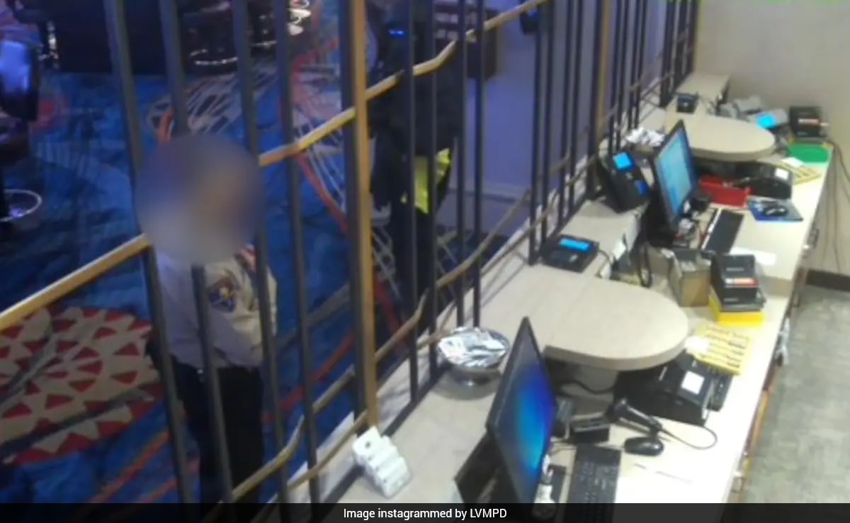Masked Man In Security Jacket Robs Las Vegas Casino At Gunpoint, Police Release Footage