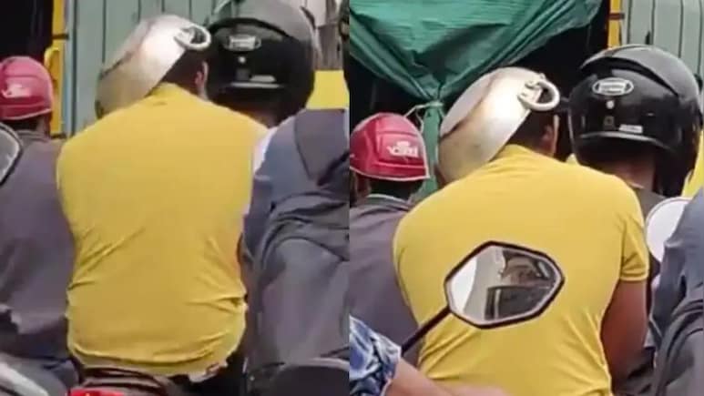 हेलमेट नहीं था इसलिए चालान से बचने के लिए बंदे ने सिर पर रख ली कड़ाही, कैमरे में कैद हुआ झन्नाटेदार Idea