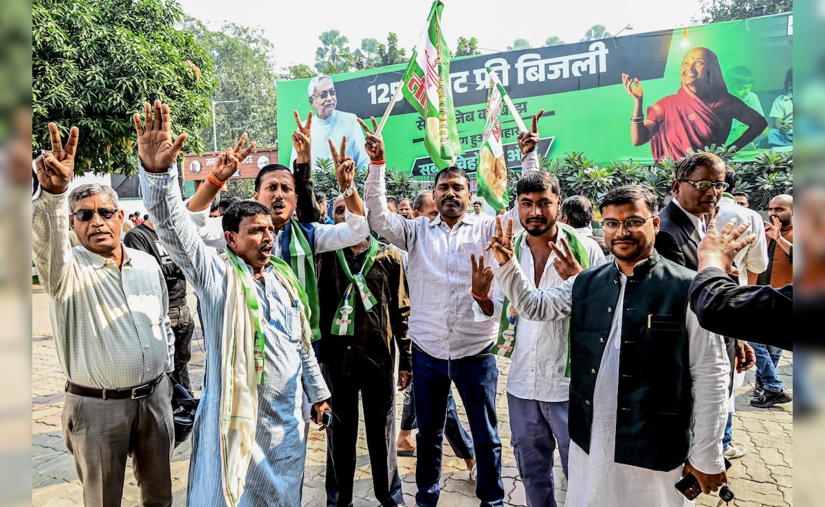 Workers and supporters celebrate at the JD(U) office in Patna. ANI