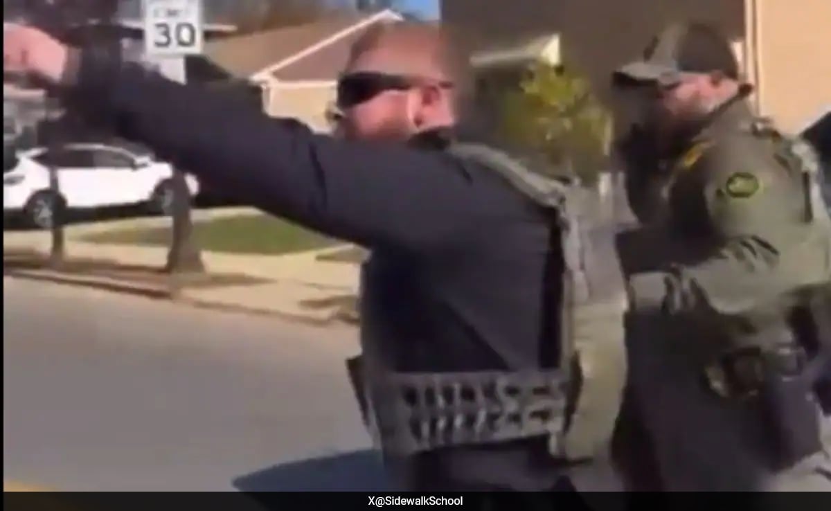 On Camera, US Immigration Agent Punches Restrained Man After Car Crash
