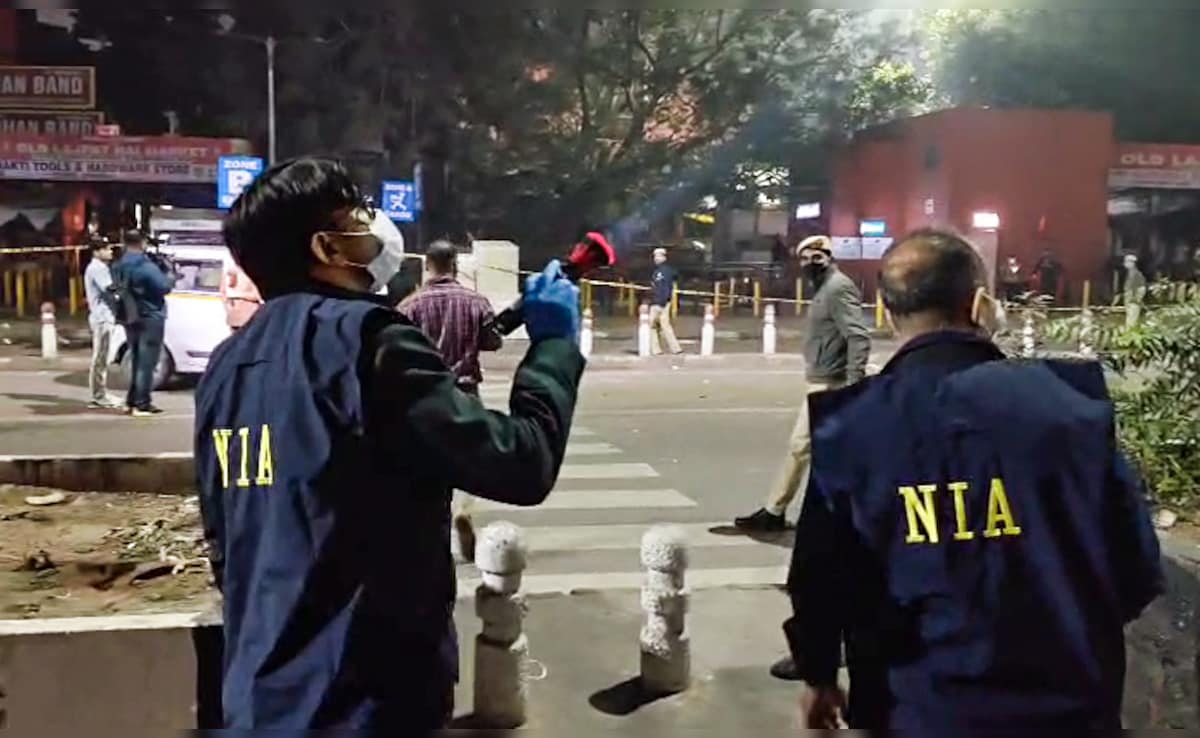 National Investigation Agency (NIA) officials at the blast spot near Delhis Red Fort area. ANI