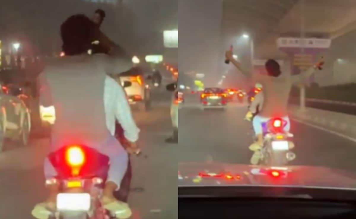 गुरुग्राम में बीच सड़क शराबियों का स्टंट, चलती बाइक पर खुलेआम बोतलें लहराते दिखे युवक, वीडियो वायरल