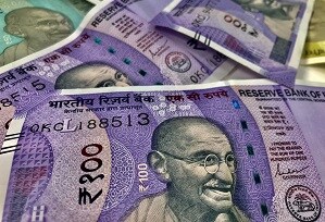 Indian Rupee Reverses Gains, Depreciates Against The U.S. Dollar